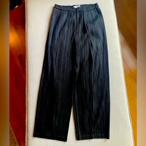 Pleats Please pants by Issey Miyake